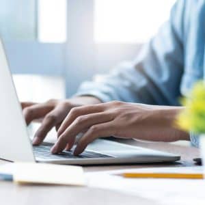 Man using computer laptop.